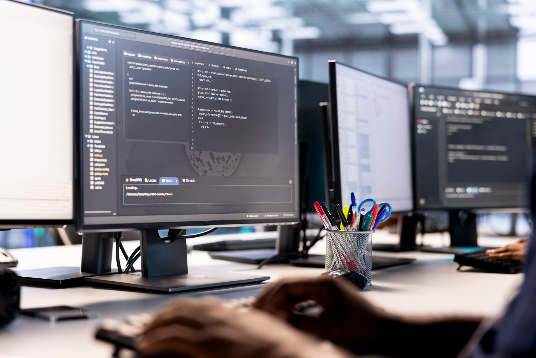 IT professional debugging and optimizing code in a server environment