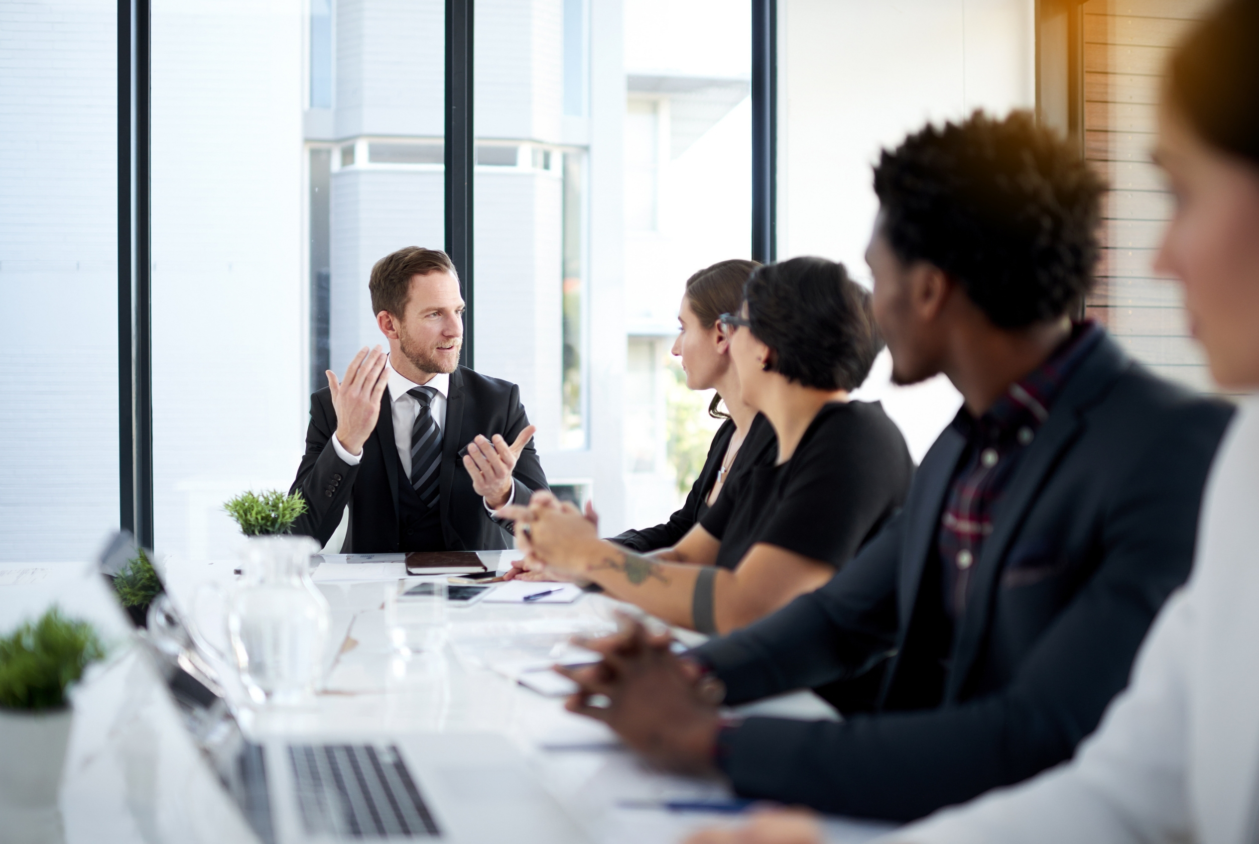 meeting-leadership-business-people-conference-room-with-ideas-proposal-corporate-planning-boardroom-men-women-conversation-review-report-b2b-workshop-startup-office